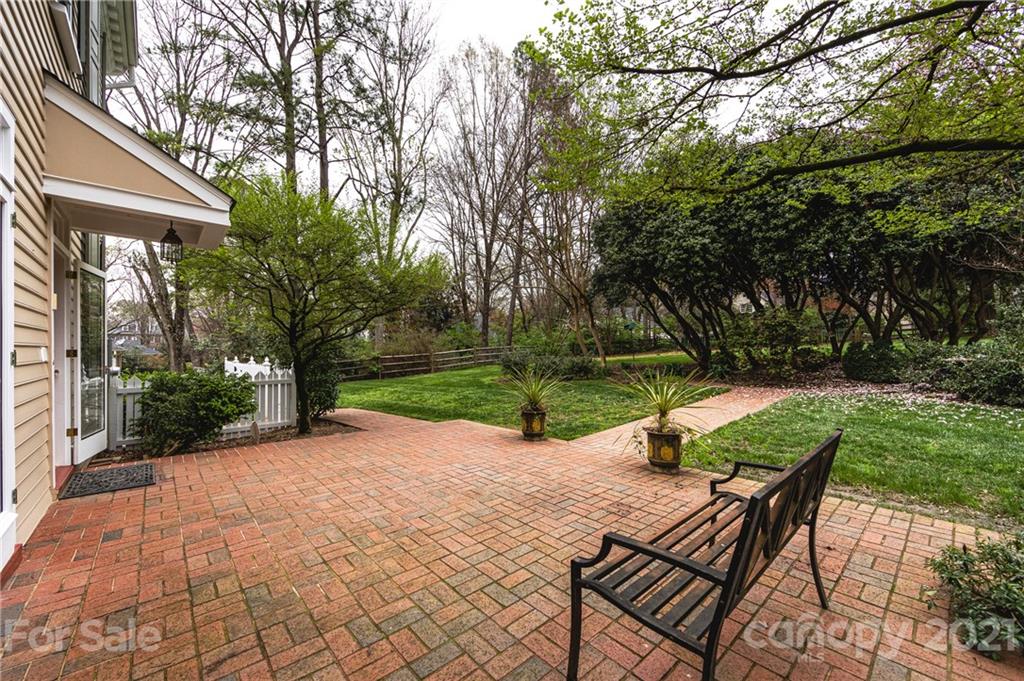 3229 Colony Road Charlotte, NC 28211 - Photo 43 of 44 a view of a table and chairs in backyard of the house