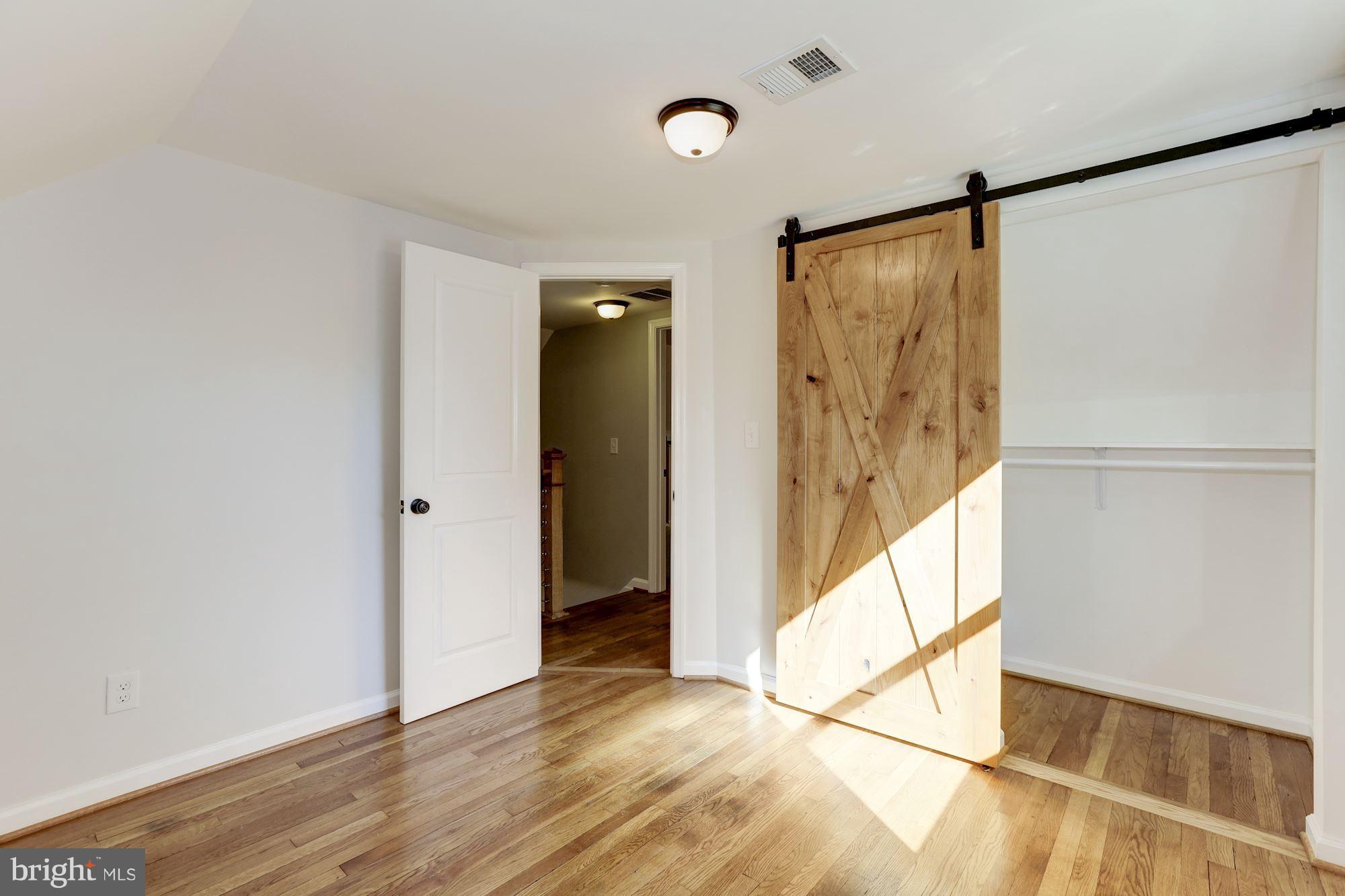 2105 Lanier Drive Silver Spring, MD 20910 - Photo 13 of 30 Bedroom Upstairs - barn door closets and built in