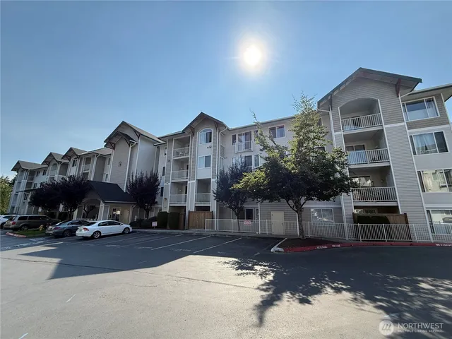 a view of a street with cars