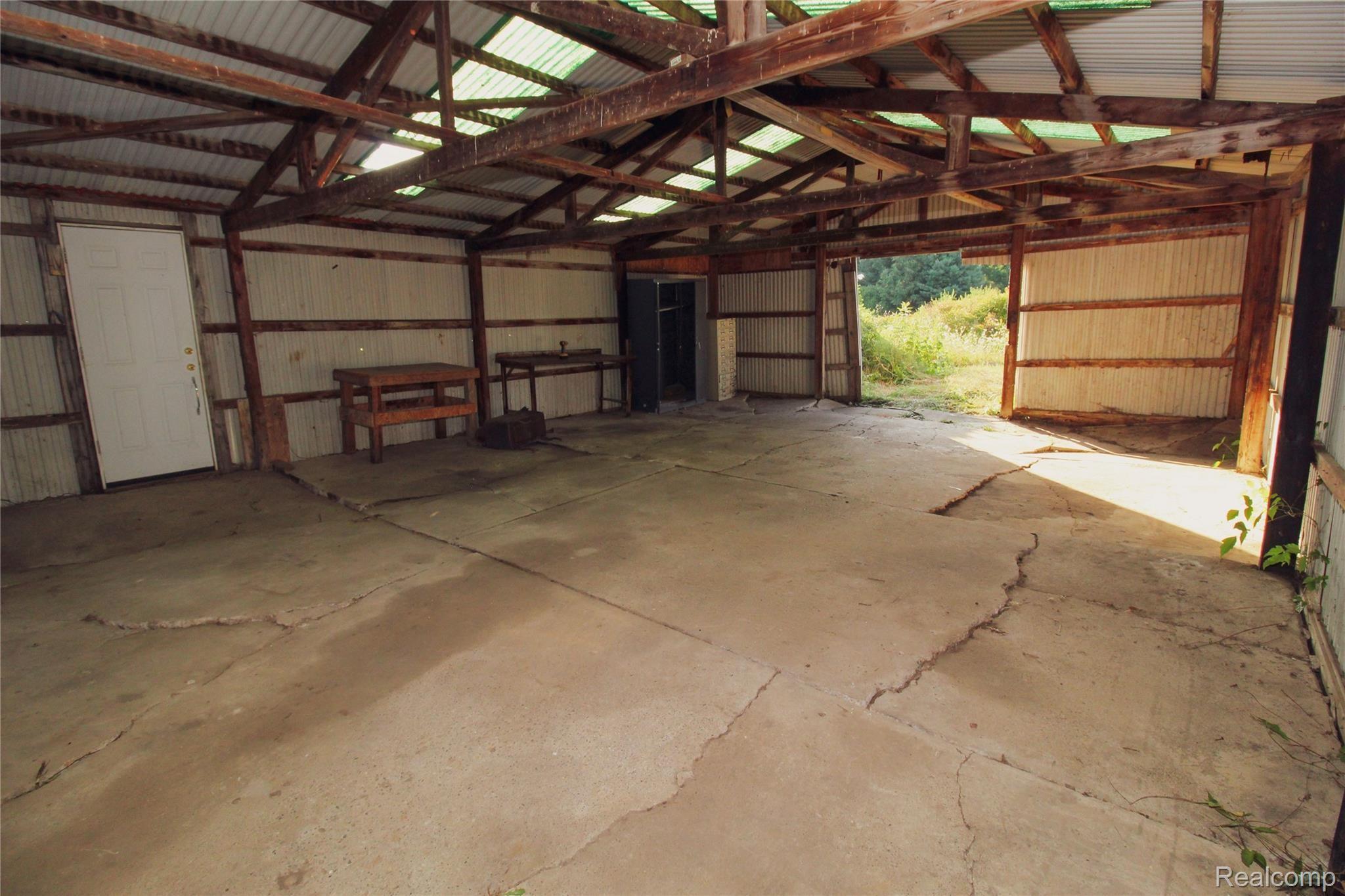 4053 Peters Road Columbiaville, MI 48421 - Photo 45 of 46 Inside 24x32 Pole Barn.jpg