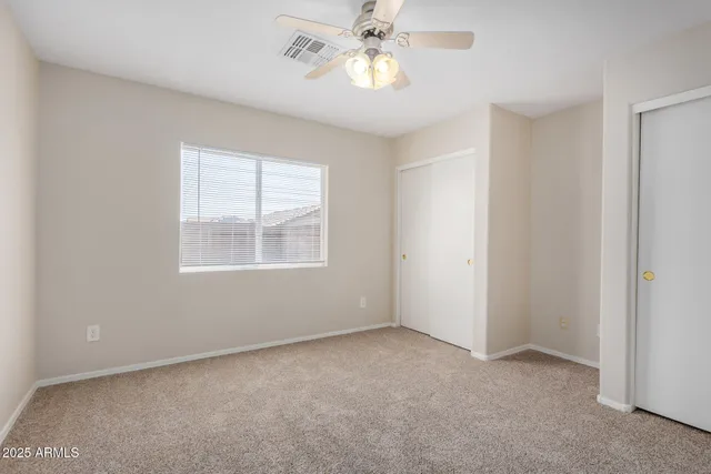 a kitchen with a stove sink and refrigerator