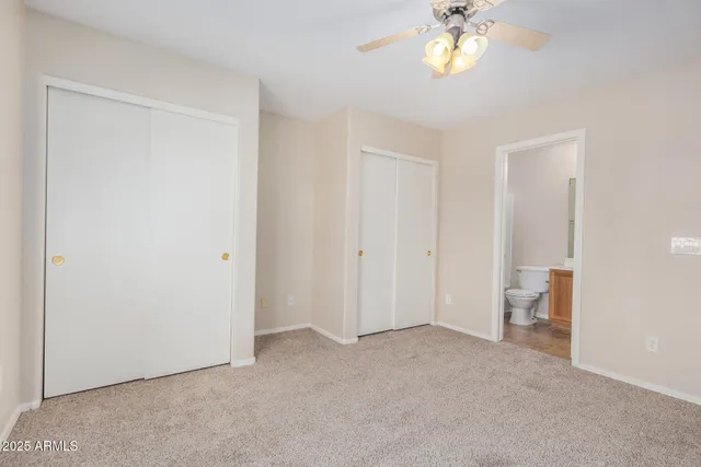 a kitchen with stainless steel appliances a stove a refrigerator and a sink