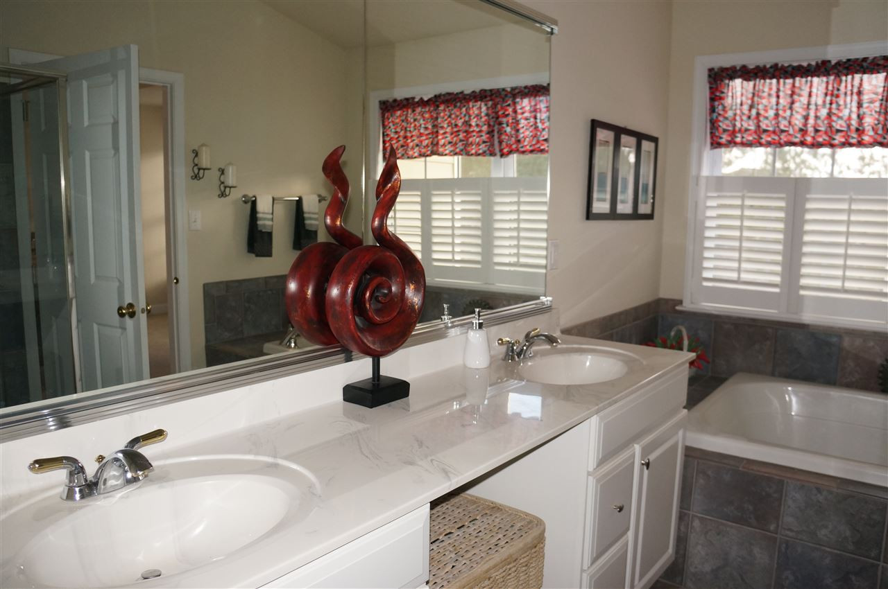 10913 Clovermill Circle Raleigh, NC 27617 - Photo 13 of 25 Double 39" vanity, lovely fixtures, seperate shower & tub. Luxury Master Bath