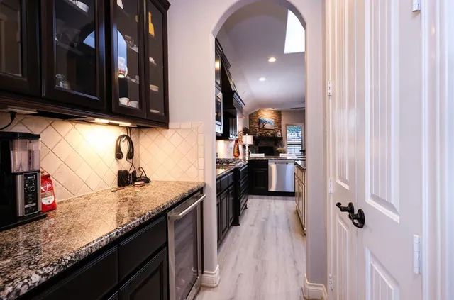 a kitchen with granite countertop lots of counter top space
