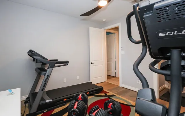 a view of a room with gym equipment
