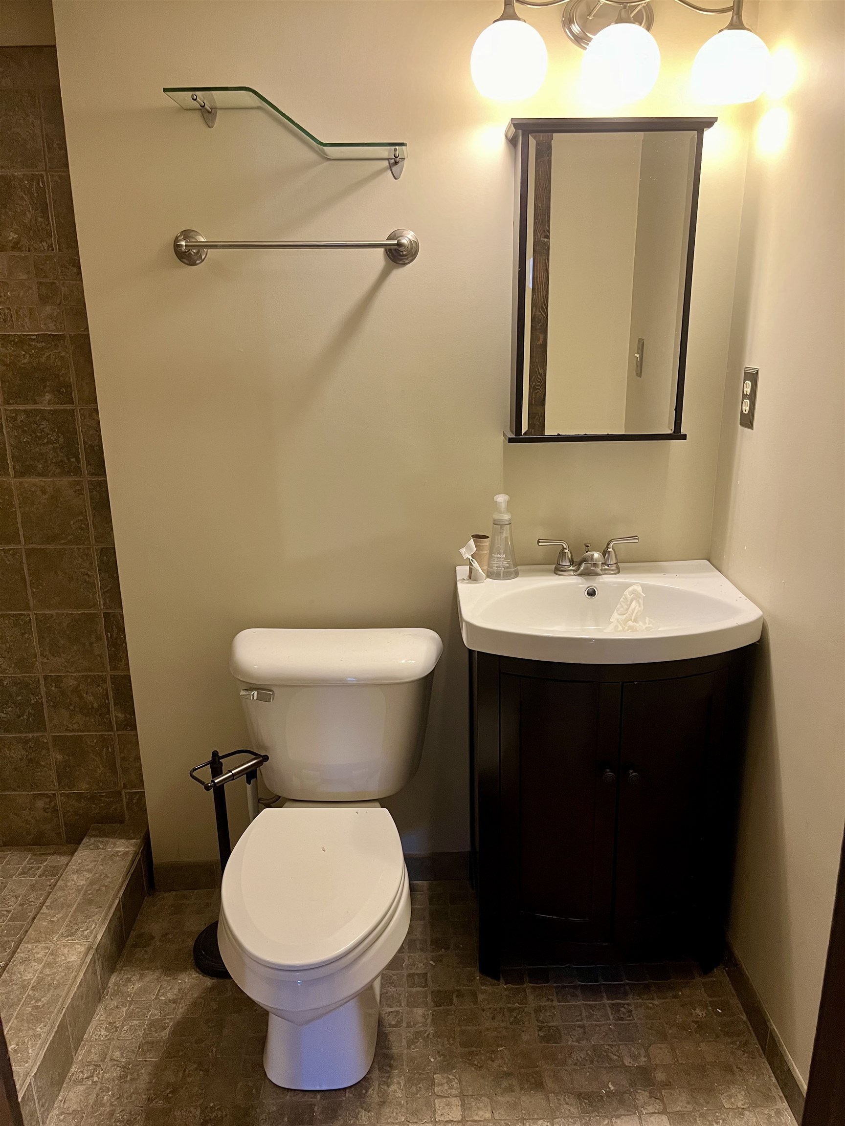 4575 Sunderman Road Rockford, IL 61114 - Photo 13 of 16 a bathroom with a sink and a toilet