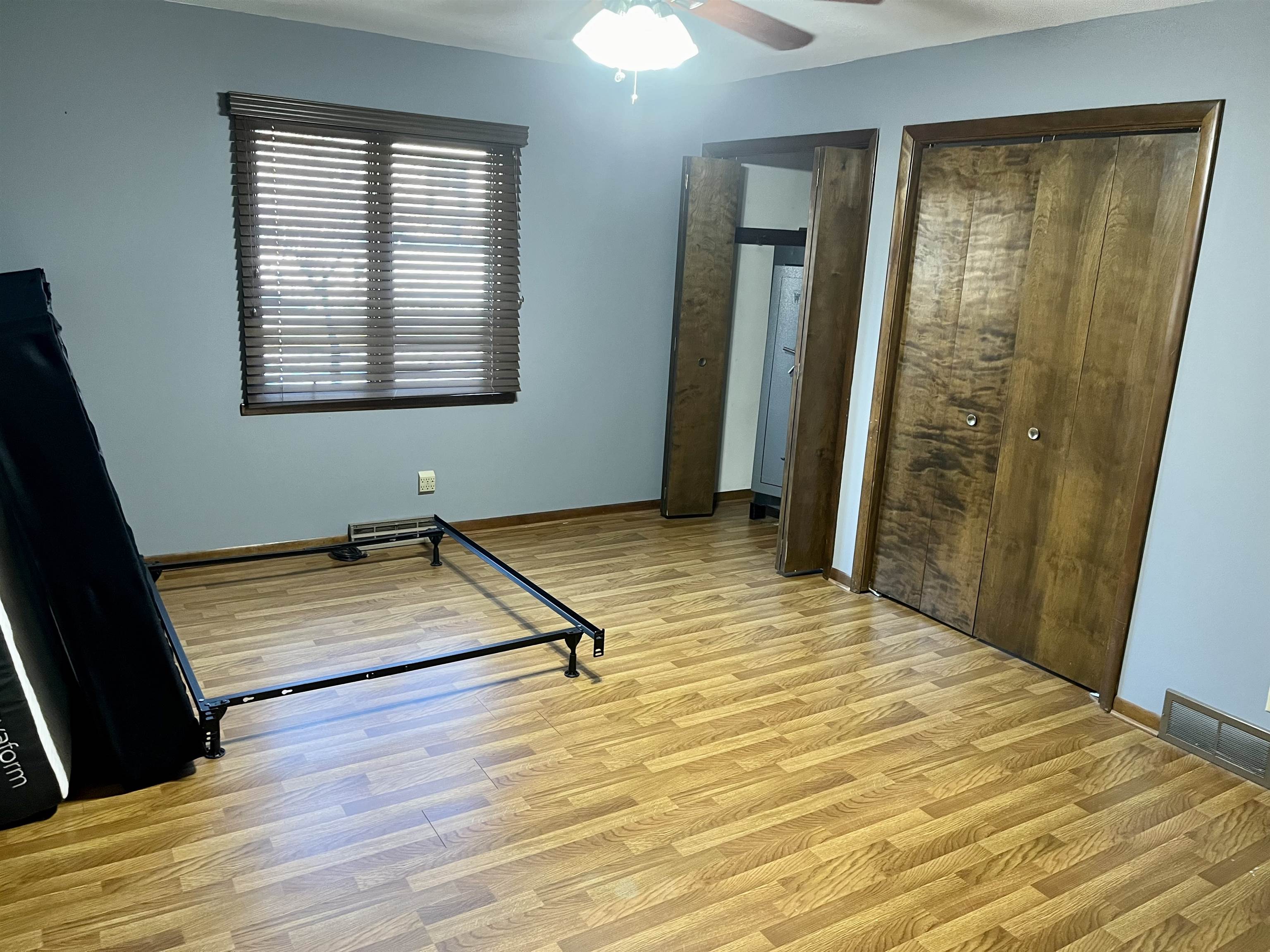 4575 Sunderman Road Rockford, IL 61114 - Photo 7 of 16 a view of a room with wooden floor and window