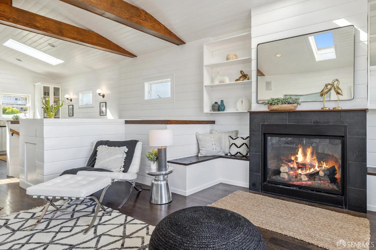 312 Kent Road Pacifica, CA 94044 - Photo 14 of 70 a living room with furniture and a fireplace