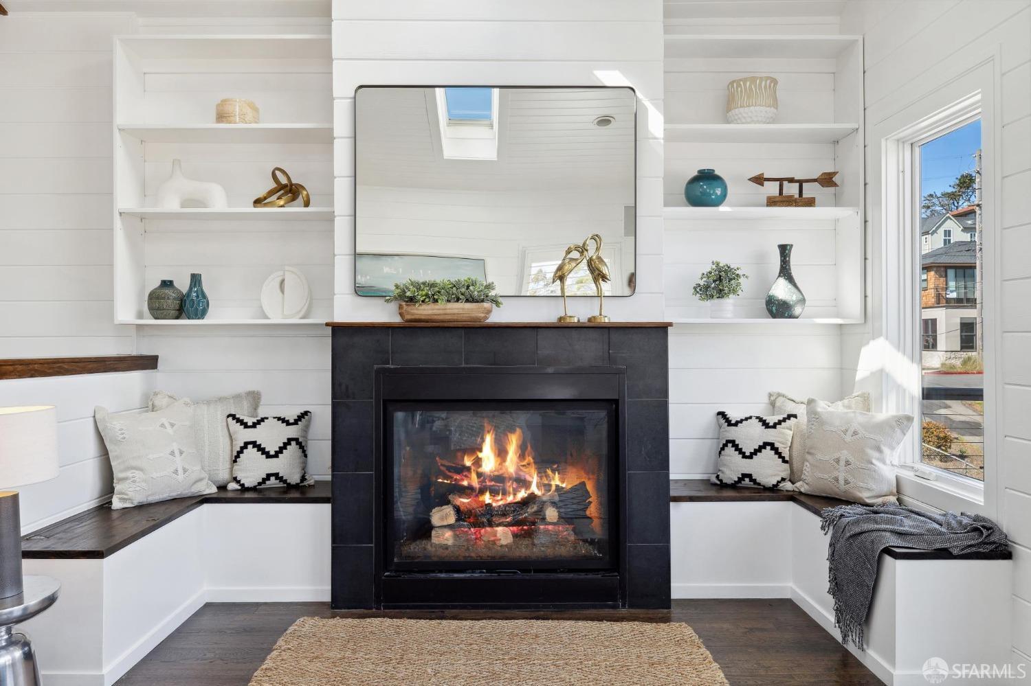 312 Kent Road Pacifica, CA 94044 - Photo 15 of 70 a living room with a fireplace with wooden floor