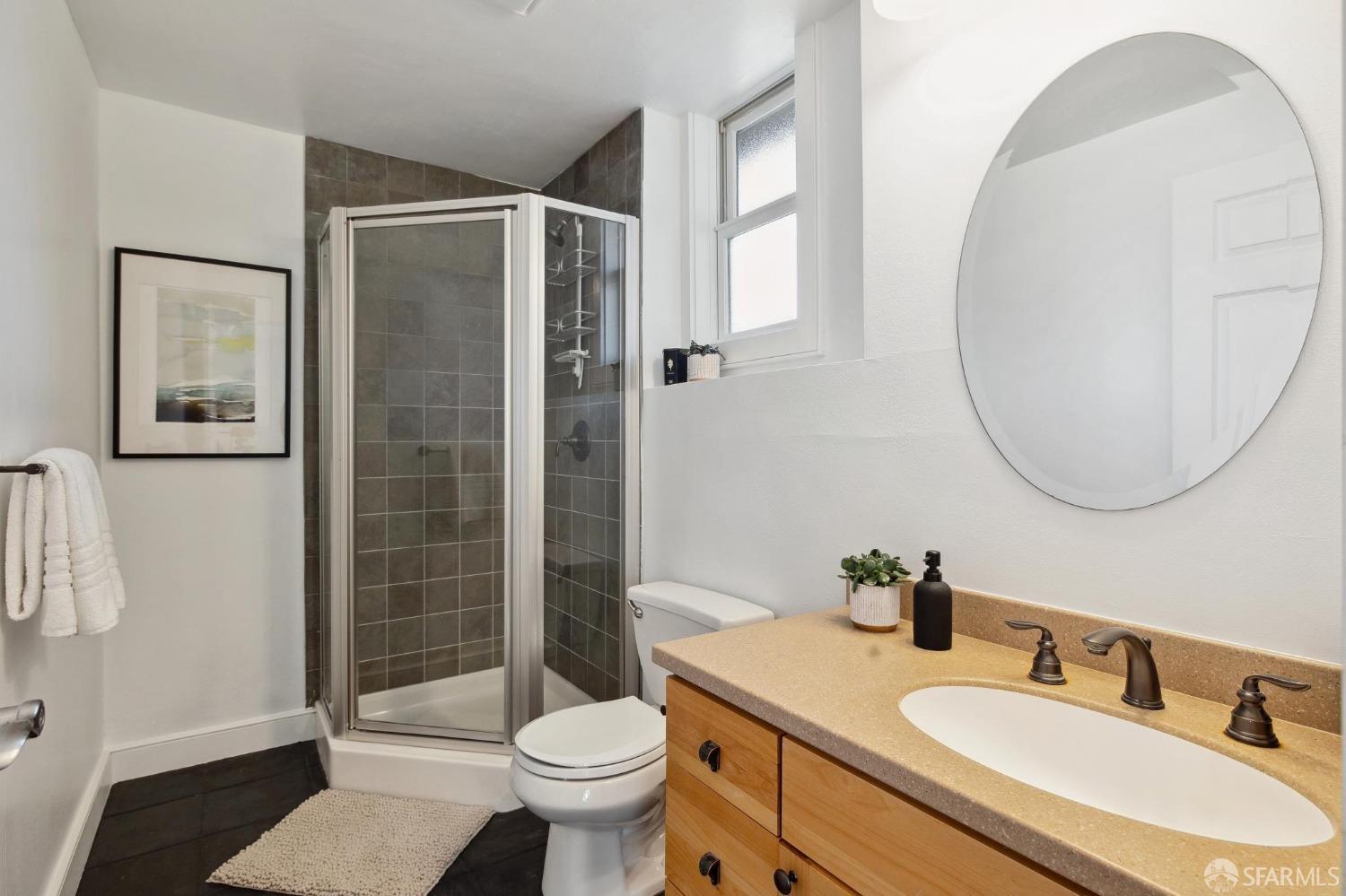 312 Kent Road Pacifica, CA 94044 - Photo 49 of 70 a bathroom with a sink toilet and shower