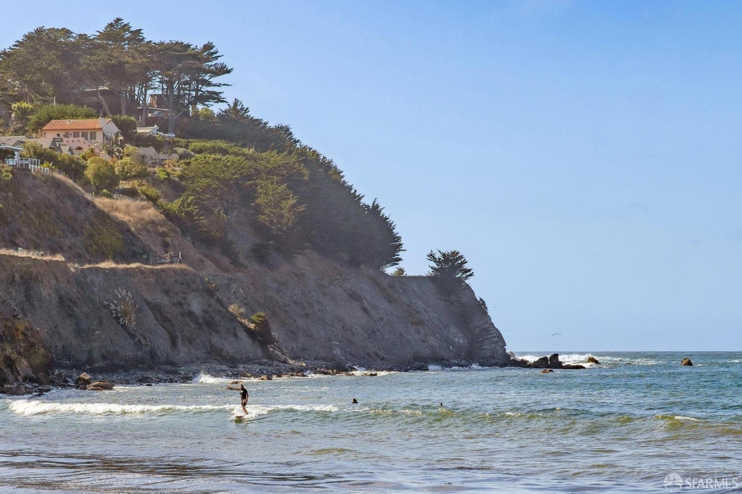312 Kent Road Pacifica, CA 94044 - Photo 67 of 70 a view of a road with a building in the background
