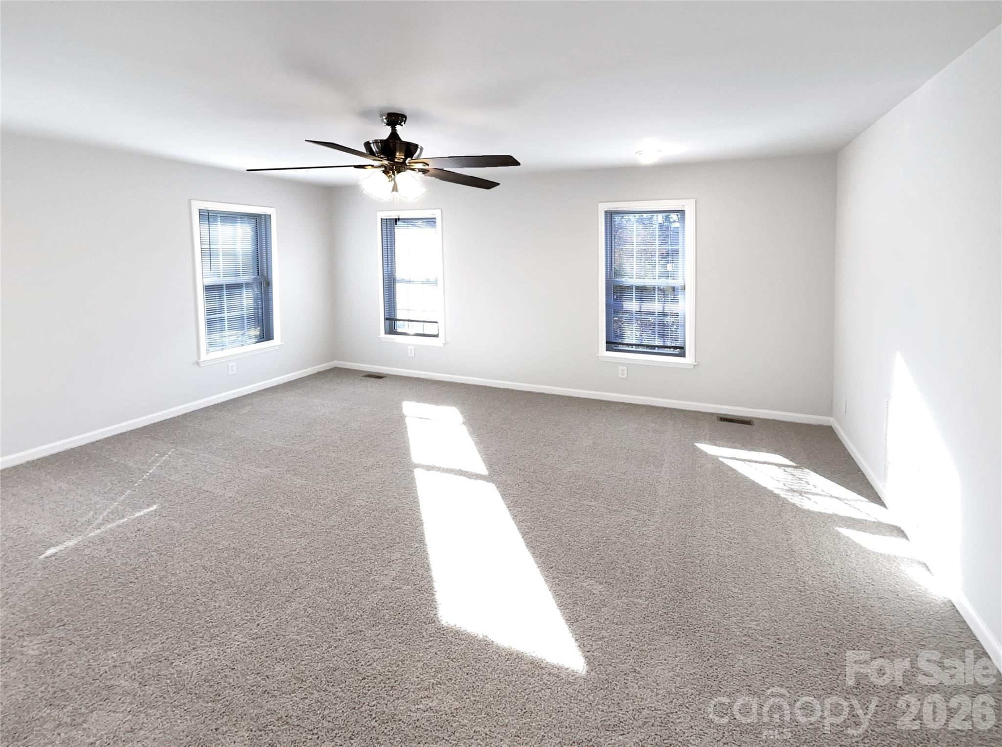 4748 Hickory Grove Road Mount Holly, NC 28120 - Photo 9 of 17 a view of empty room with windows