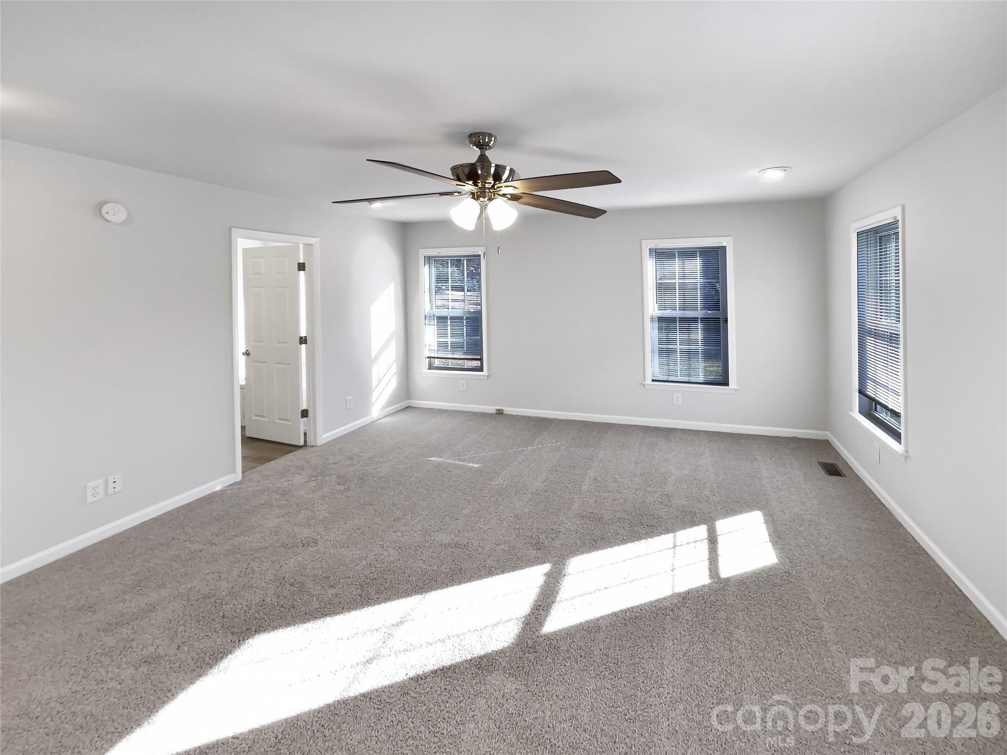 4748 Hickory Grove Road Mount Holly, NC 28120 - Photo 10 of 17 a view of an empty room with a window