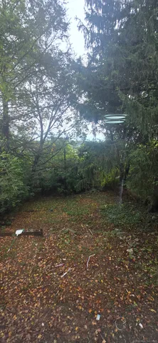 a view of lake with green space