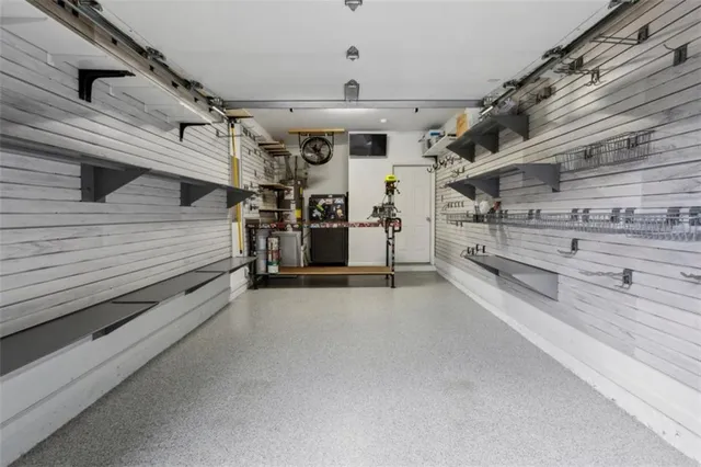 a view of backyard with seating area and green space