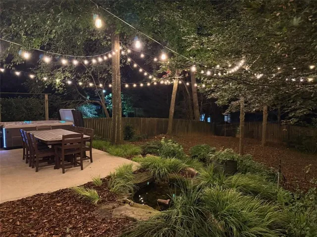 a view of a yard with plants