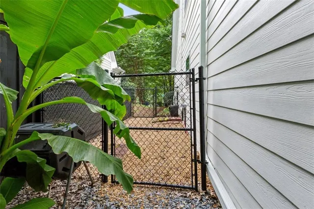 a view of backyard with green space