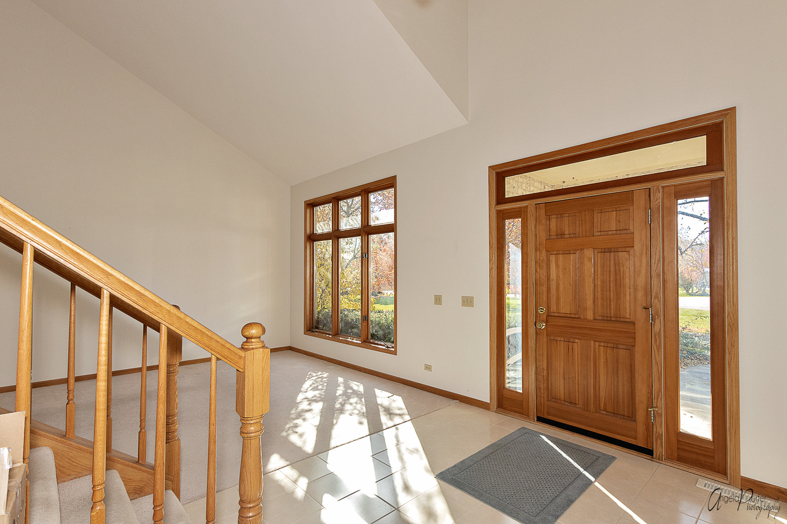 1716 Walnut Court Spring Grove, IL 60081 - Photo 3 of 55 a view of an entryway with wooden floor and door