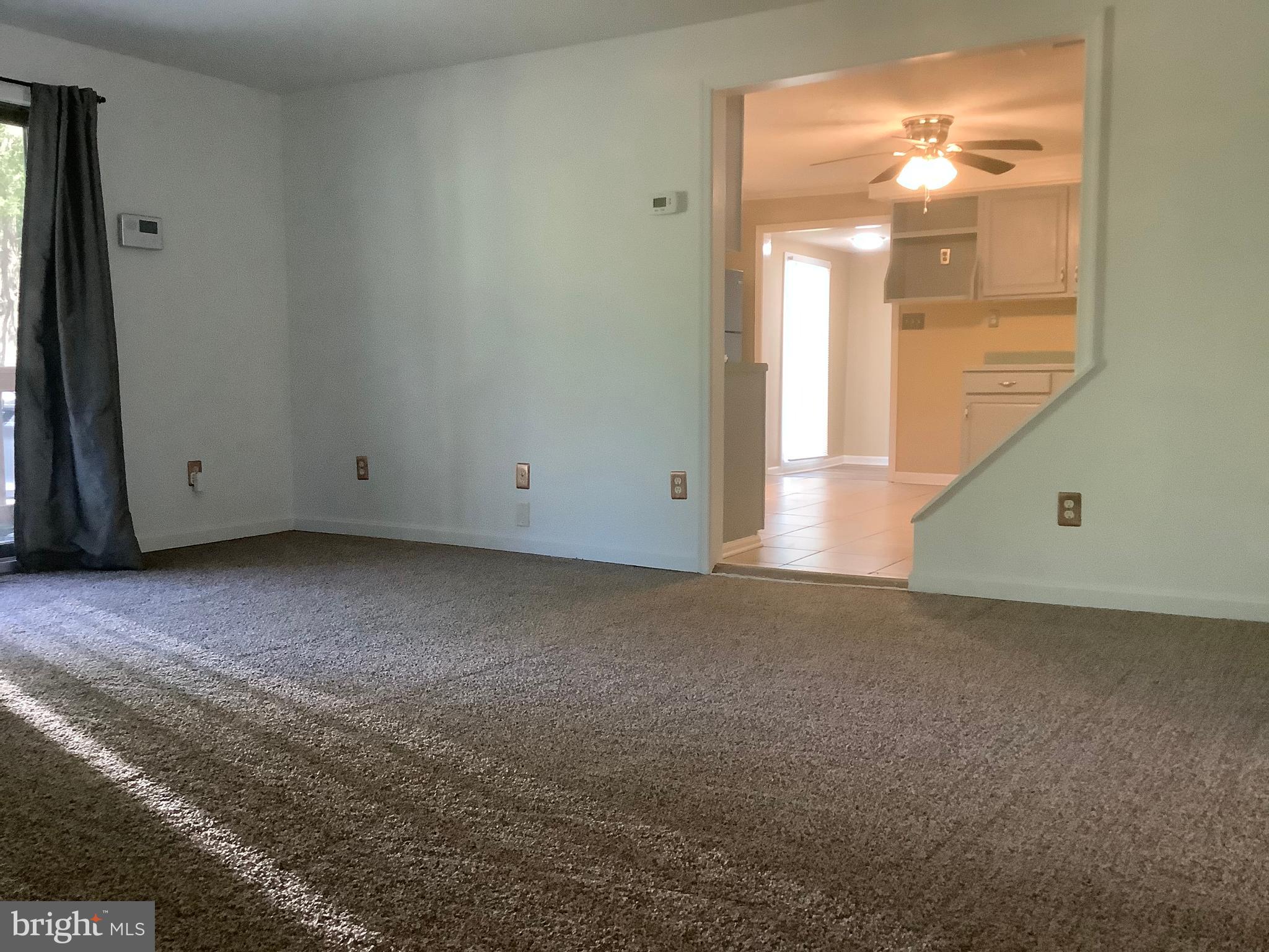 207 Sharp Road Denton, MD 21629 - Photo 10 of 30 Living Room with View to Kitchen