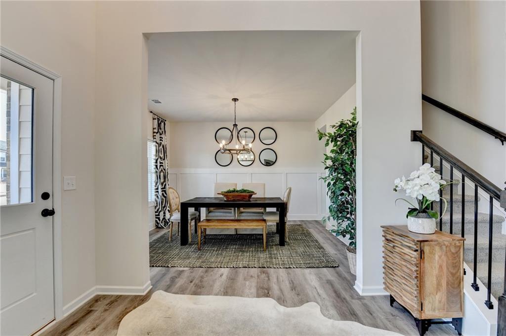 306 Rodeo Drive Auburn, GA 30011 - Photo 3 of 86 a bedroom with furniture and a window