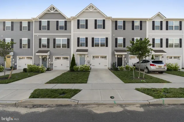 a front view of multiple houses