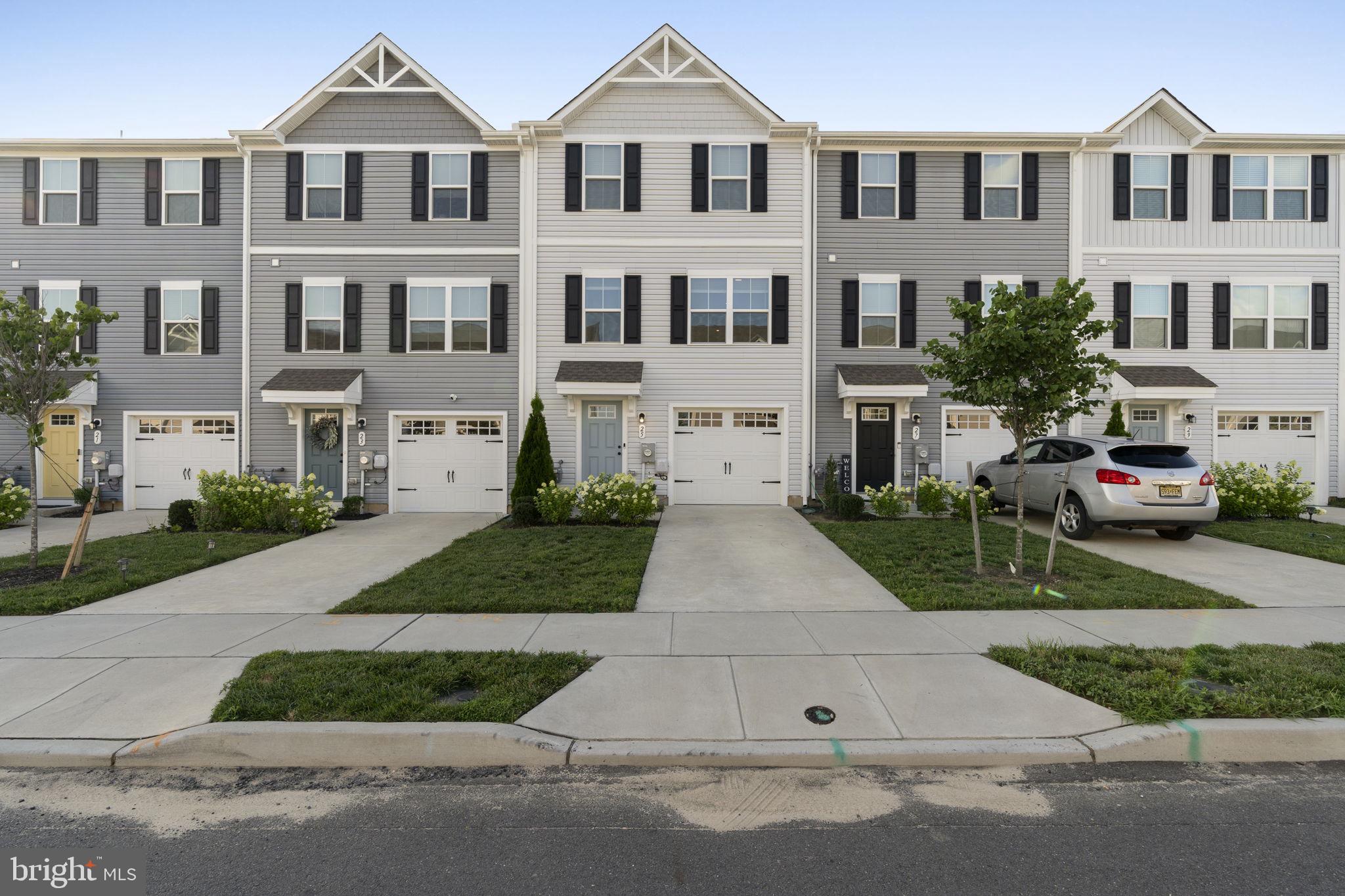 25 Wendowski Street Beverly, NJ 08010 - Photo 1 of 29 a front view of multiple houses