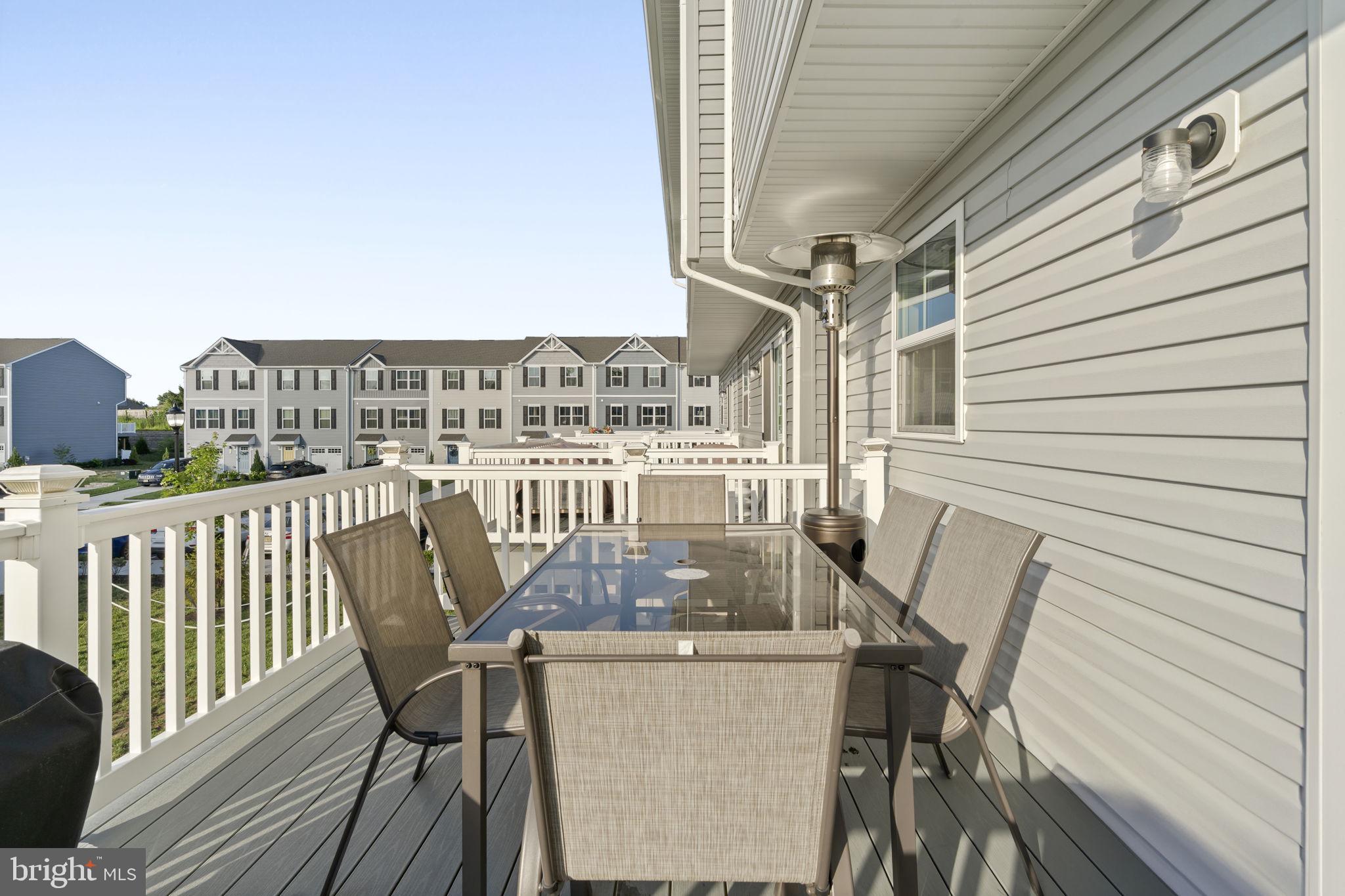 25 Wendowski Street Beverly, NJ 08010 - Photo 16 of 29 a view of a balcony with table and chairs