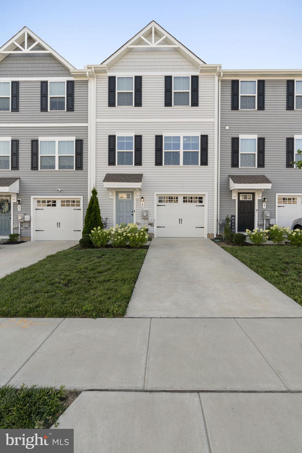 25 Wendowski Street Beverly, NJ 08010 - Photo 2 of 29 a view of a white house with a yard and plants