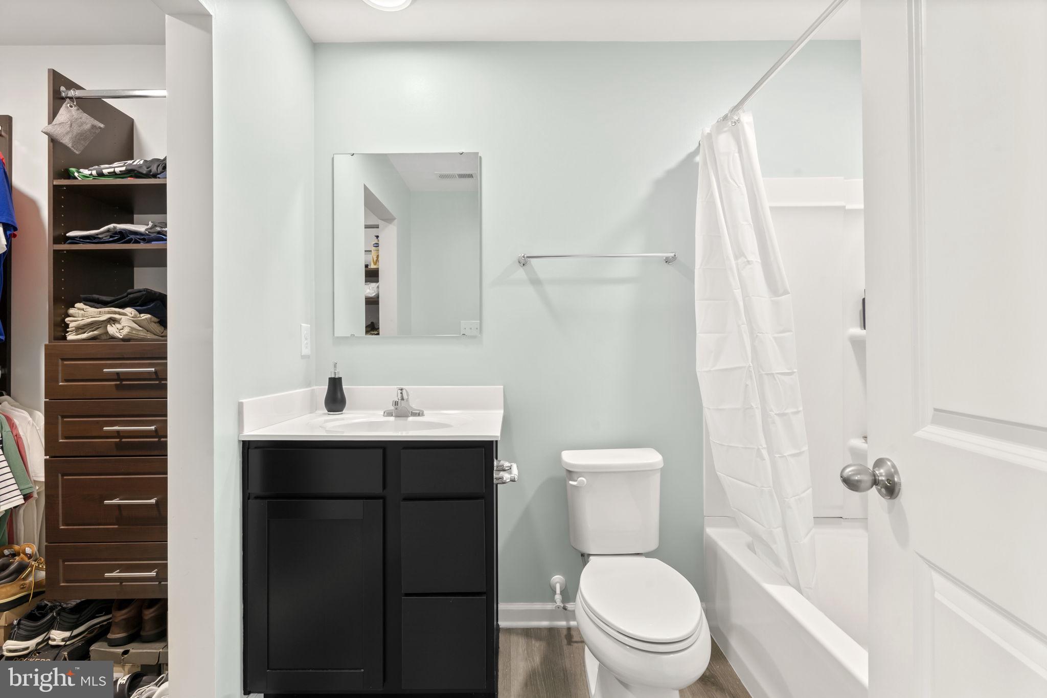 25 Wendowski Street Beverly, NJ 08010 - Photo 22 of 29 a bathroom with a sink a toilet and shower