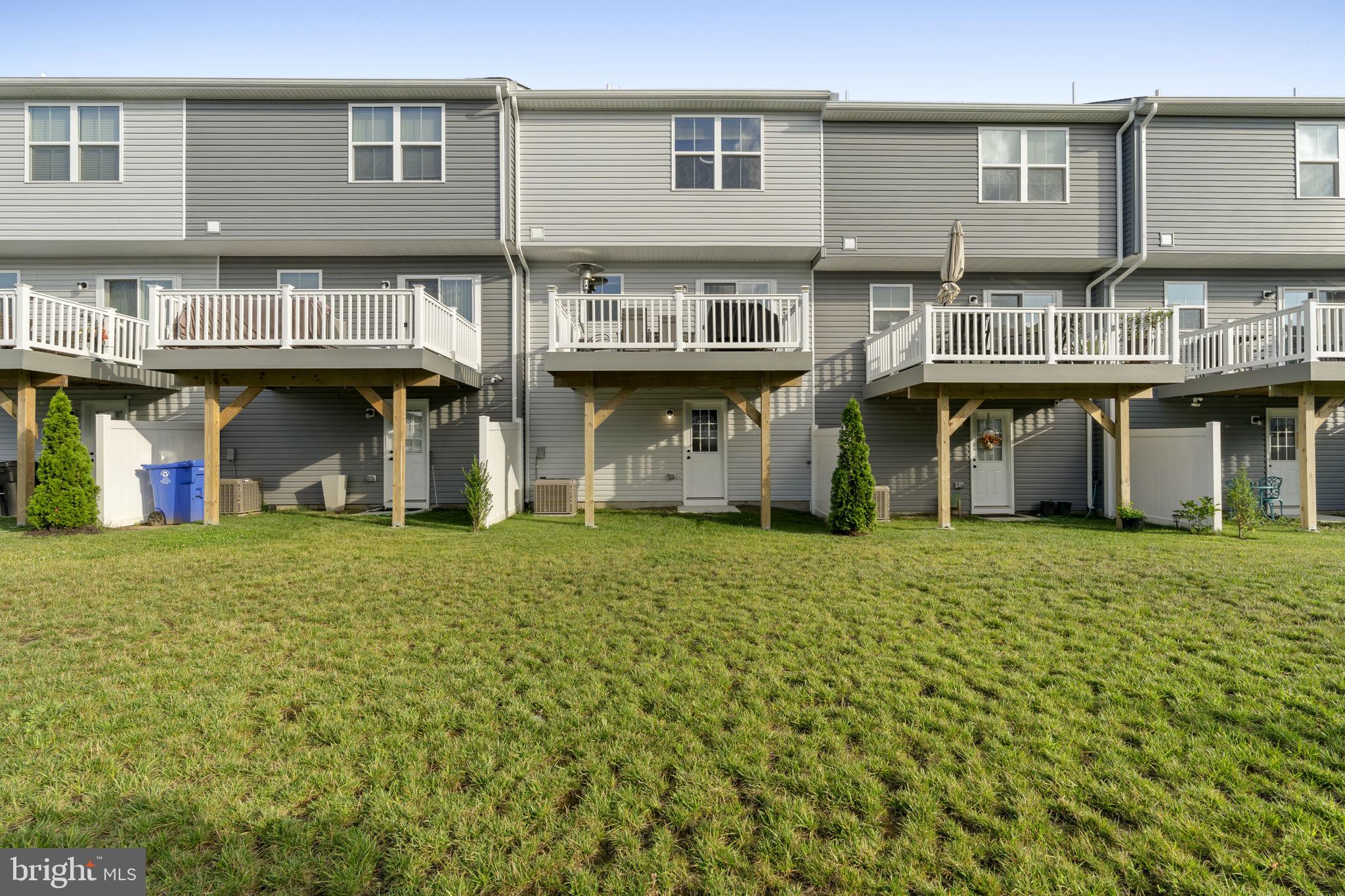 25 Wendowski Street Beverly, NJ 08010 - Photo 28 of 29 a front view of a house with a garden