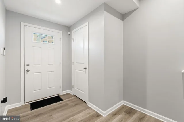 a view of room with hardwood floor