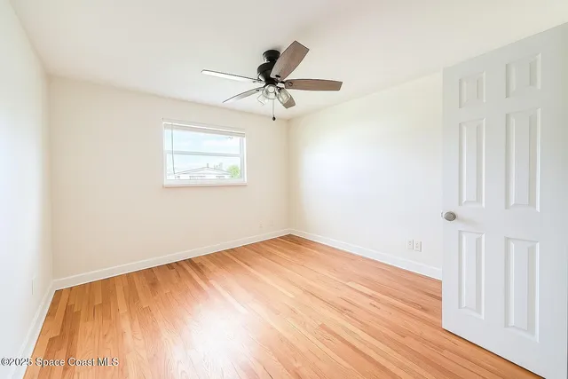 a bedroom with a bed and a table