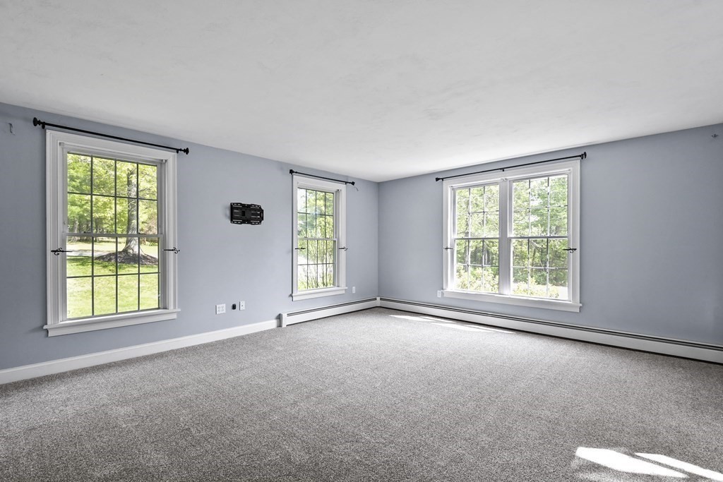 210 Rocky Road Northbridge, MA 01588 - Photo 20 of 37 a view of an empty room with a window