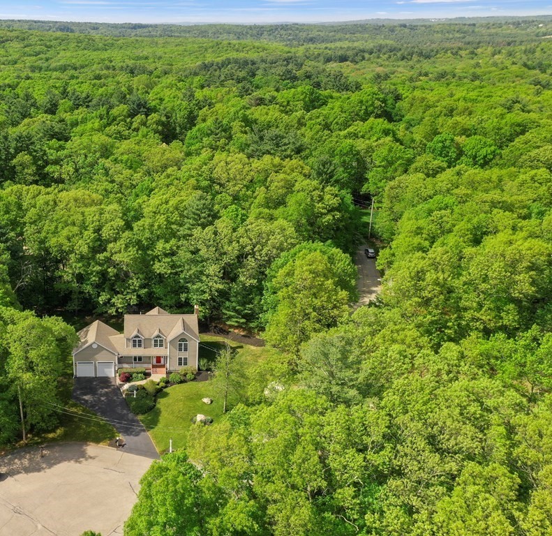 210 Rocky Road Northbridge, MA 01588 - Photo 3 of 37 an aerial view of a house with a yard