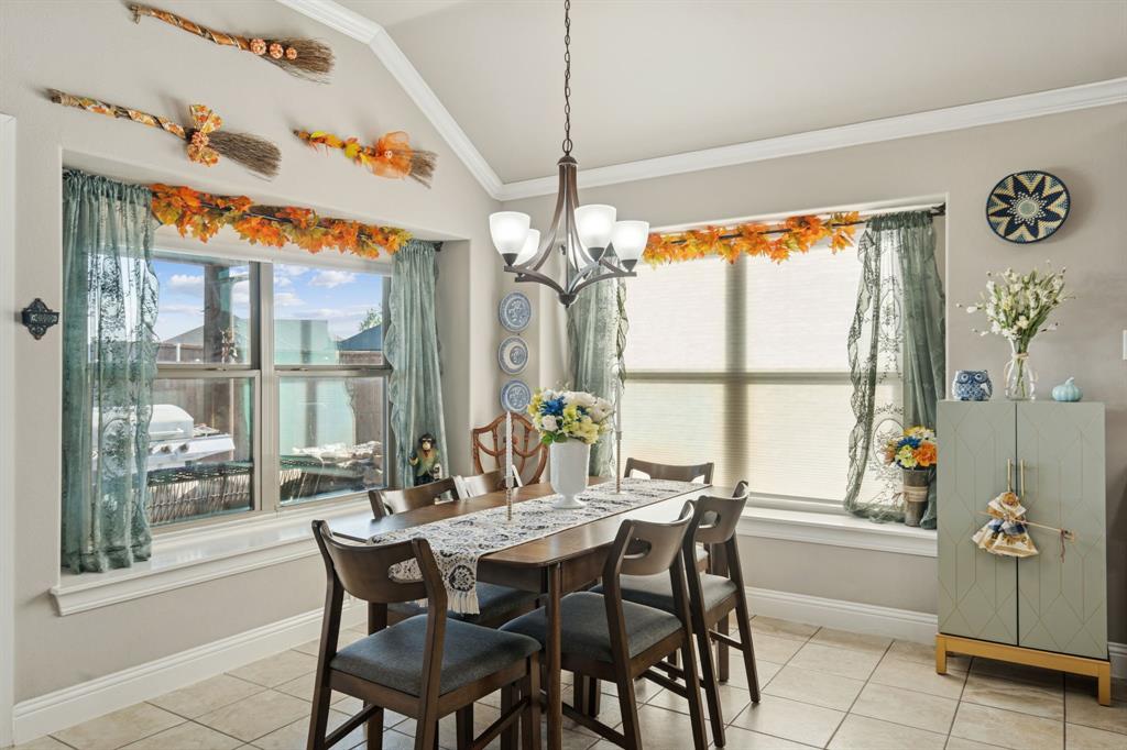 105 Cherry Point Drive Palmer, TX 75152 - Photo 8 of 32 a dining room with furniture and window