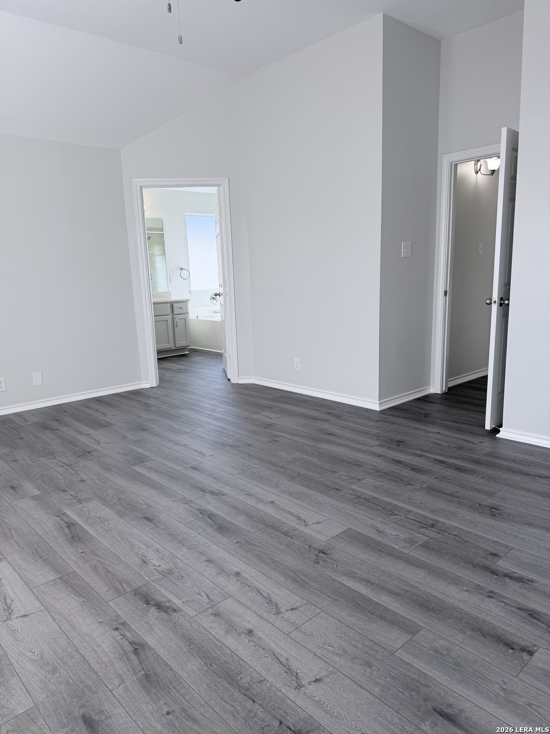 6736 Terra Rye San Antonio, TX 78240 - Photo 18 of 26 a view of empty room with wooden floor