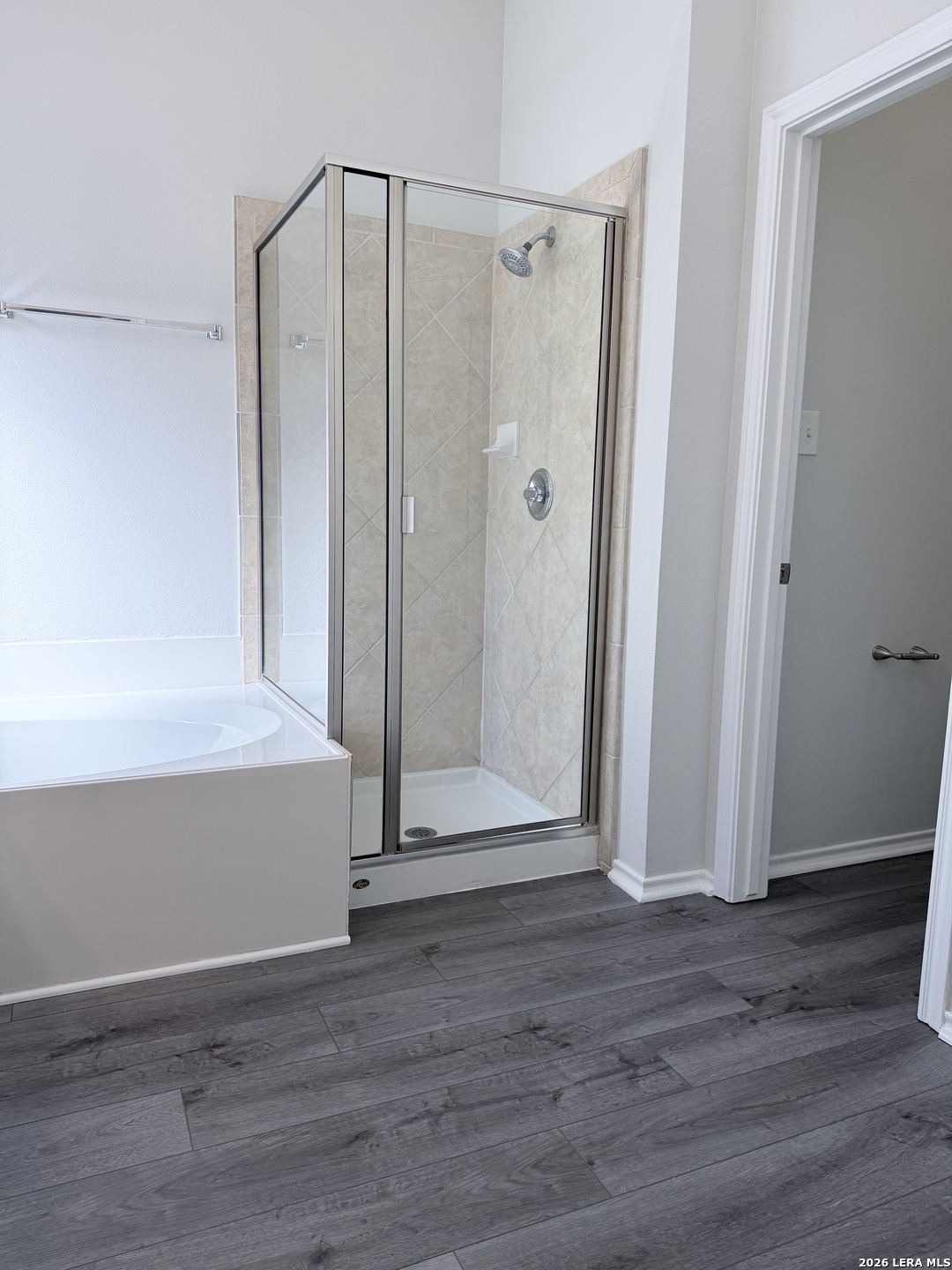 6736 Terra Rye San Antonio, TX 78240 - Photo 22 of 26 a view of a bathroom with wooden floor