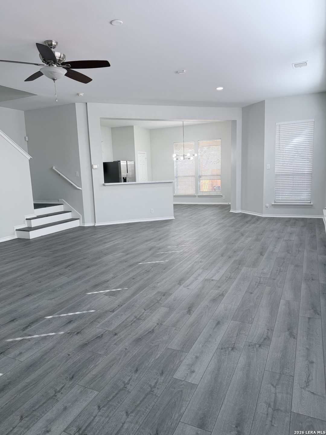 6736 Terra Rye San Antonio, TX 78240 - Photo 5 of 26 a view of empty room with wooden floor and fan
