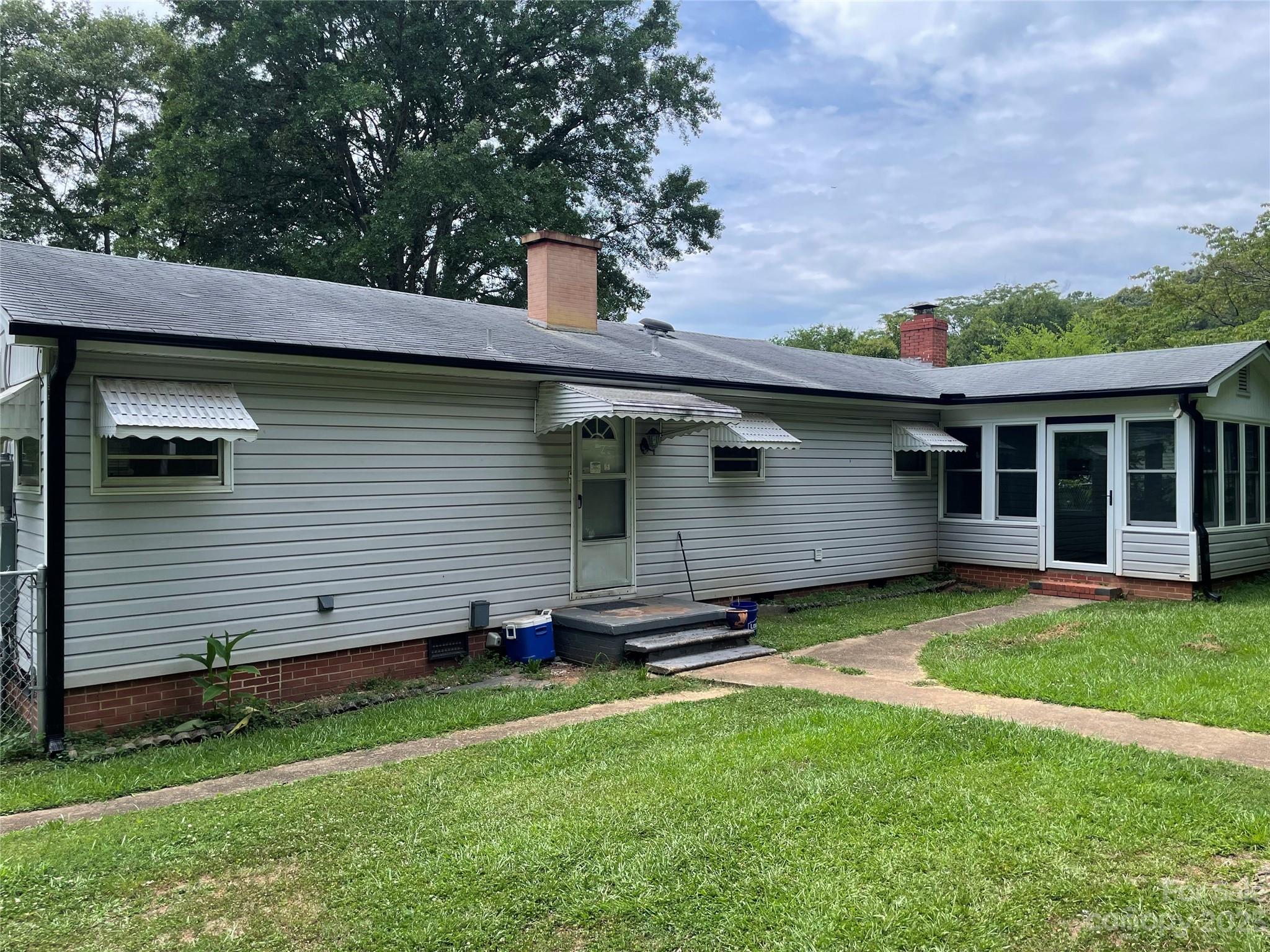 a view of a backyard with a garden
