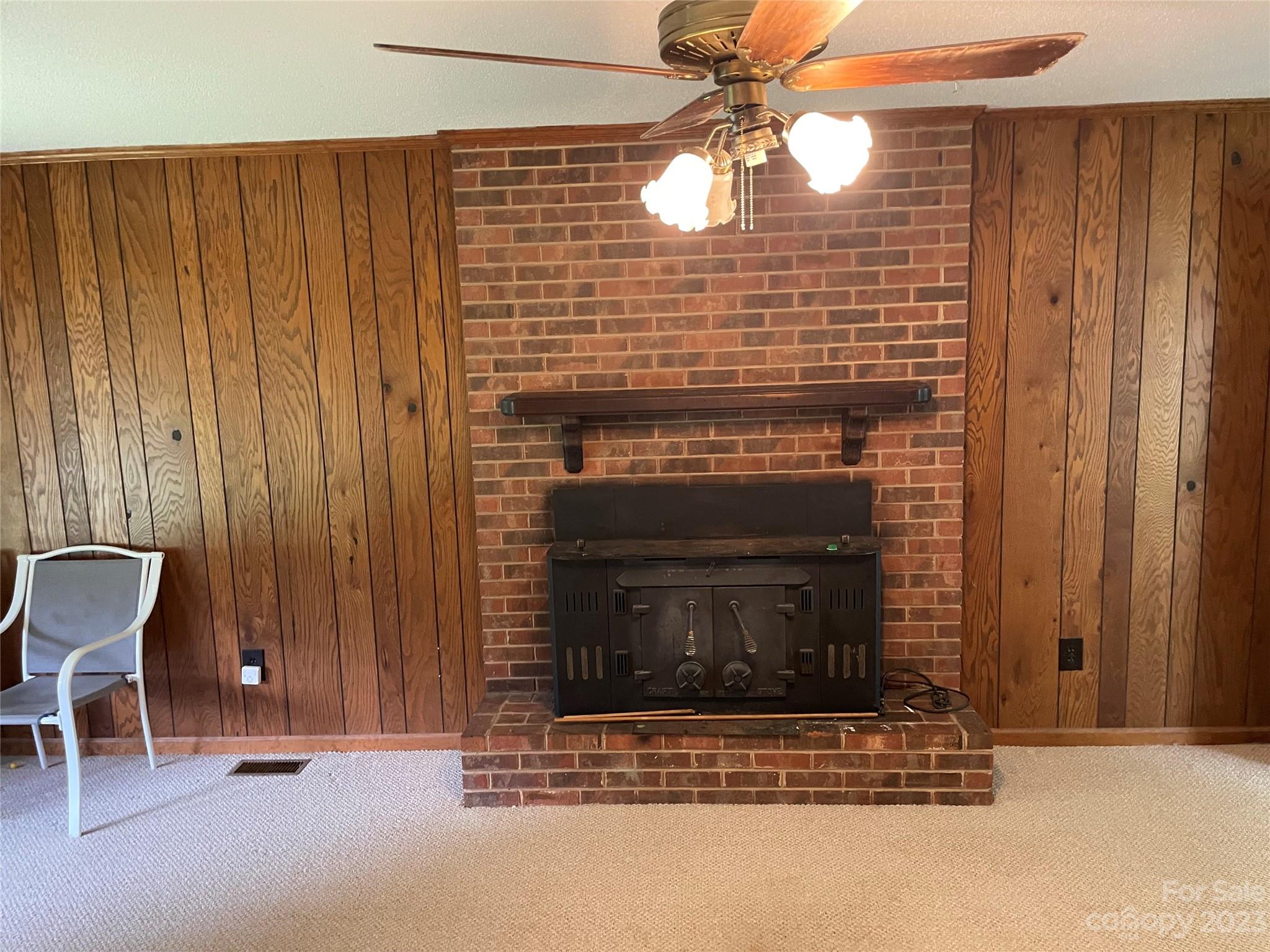 1125 Dunlap Roddey Road Rock Hill, SC 29730 - Photo 12 of 28 a fireplace with wooden floor