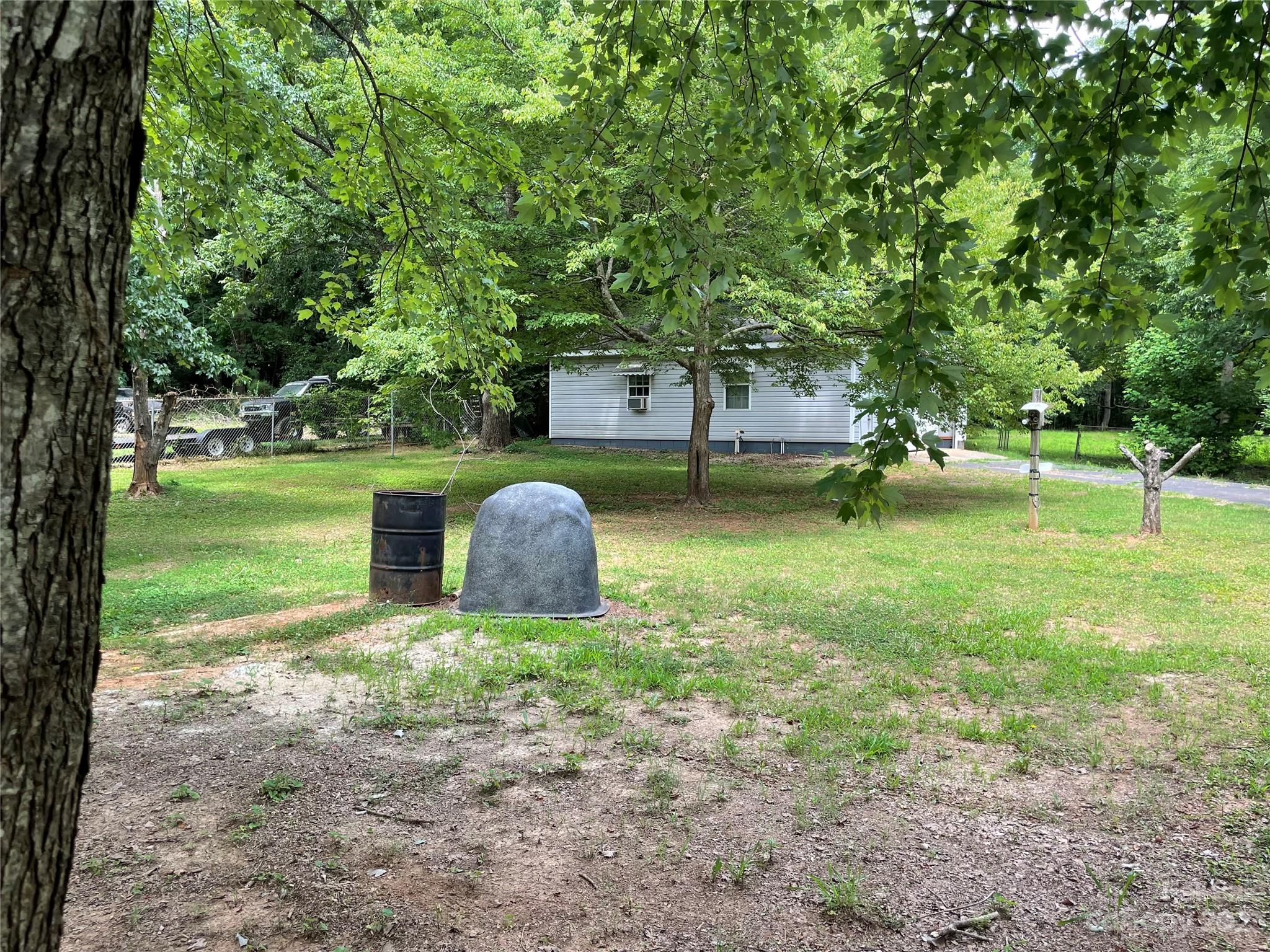 1125 Dunlap Roddey Road Rock Hill, SC 29730 - Photo 27 of 28 a view of a backyard with large trees