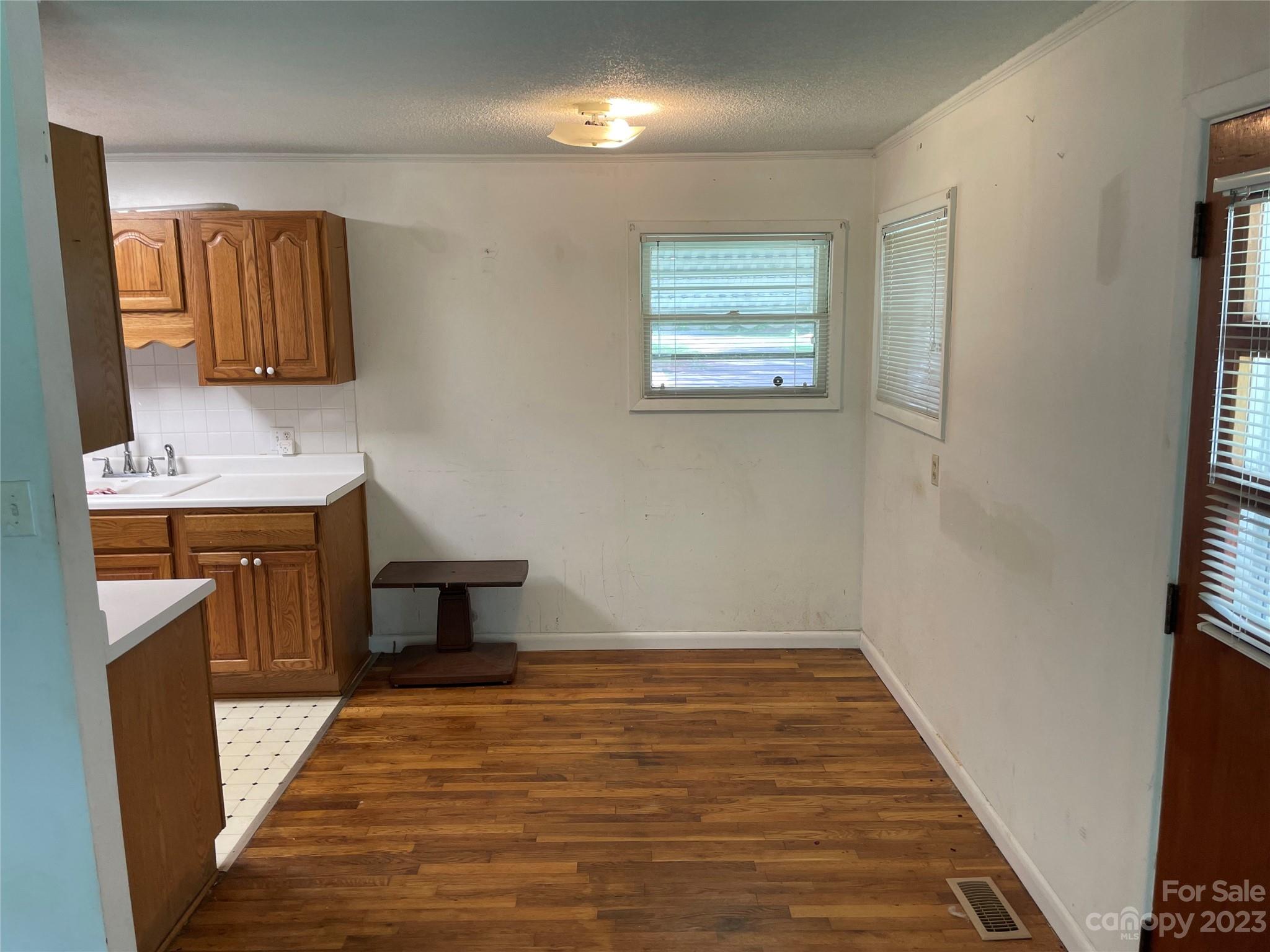 1125 Dunlap Roddey Road Rock Hill, SC 29730 - Photo 5 of 28 a view of a livingroom with wooden floor and a sink
