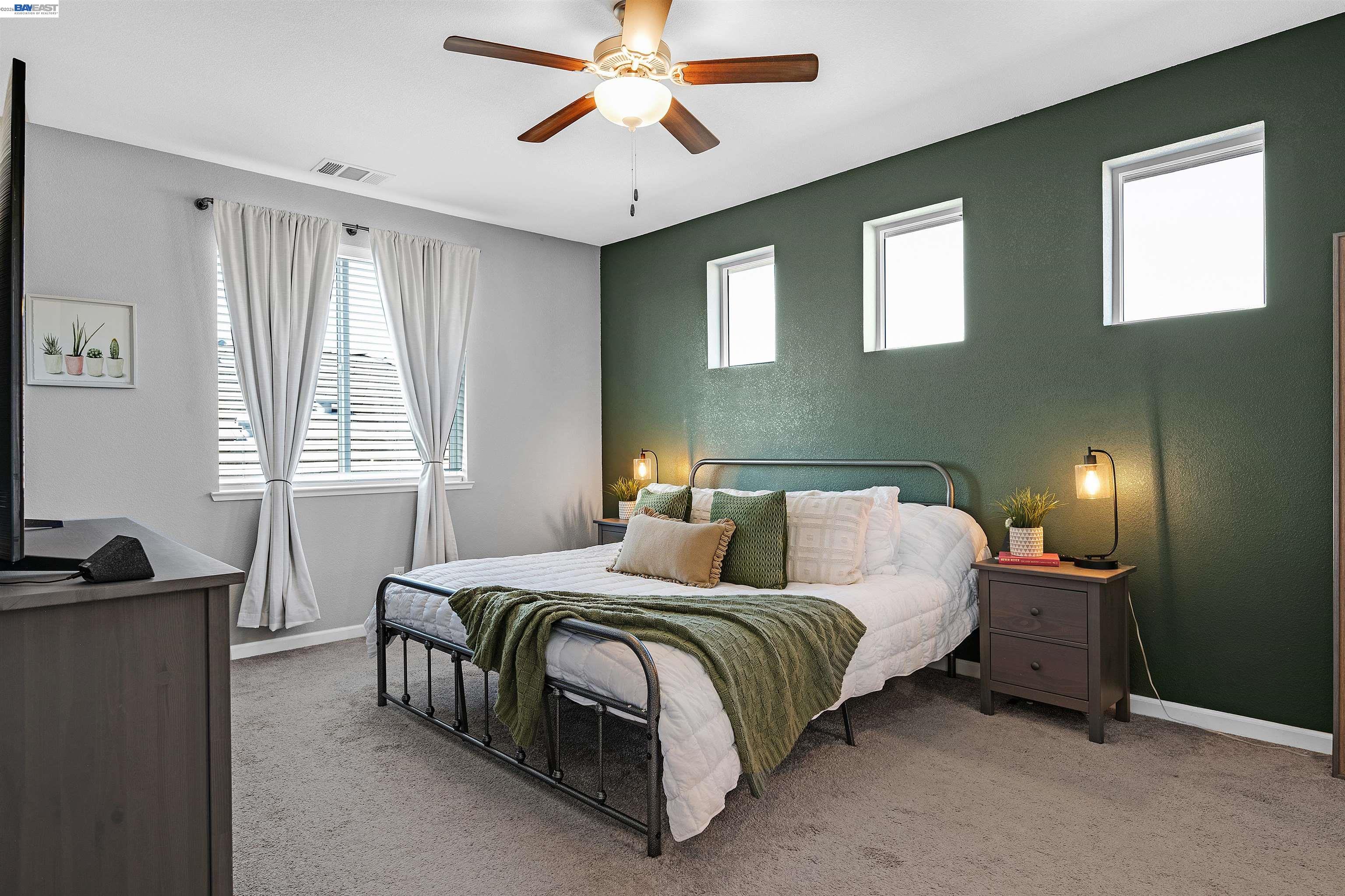 1589 Friendly Street Manteca, CA 95337 - Photo 26 of 50 a bedroom with bed and a window