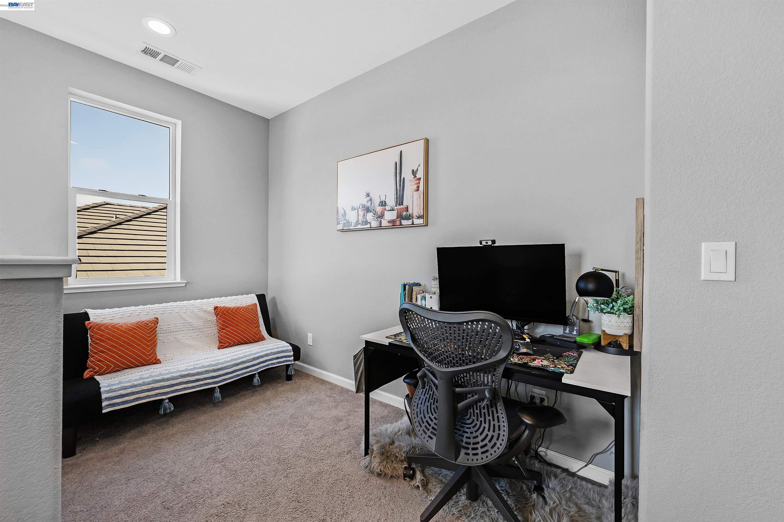 1589 Friendly Street Manteca, CA 95337 - Photo 34 of 50 a work room with furniture and a window