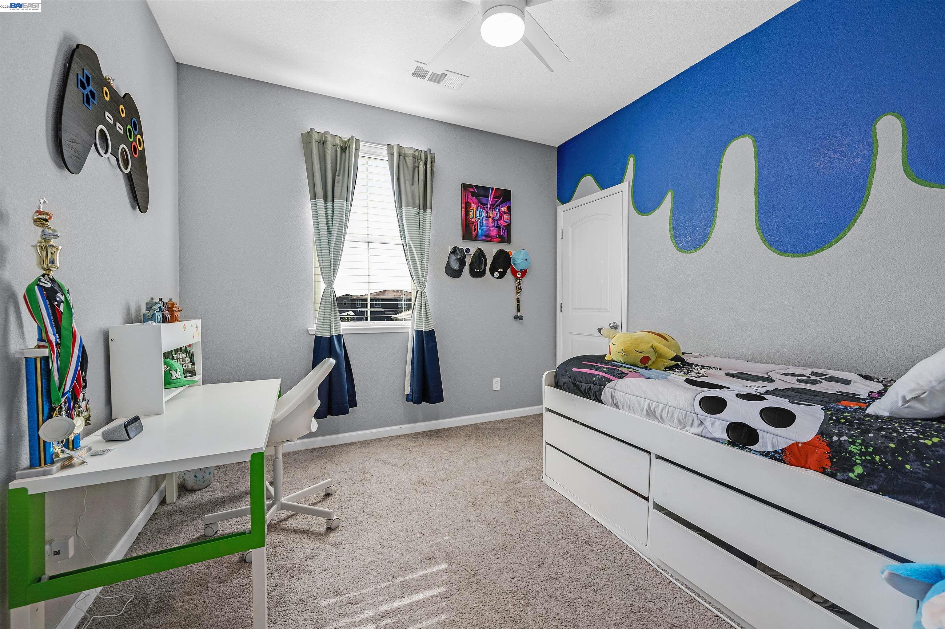 1589 Friendly Street Manteca, CA 95337 - Photo 36 of 50 a bedroom with a bed and furniture