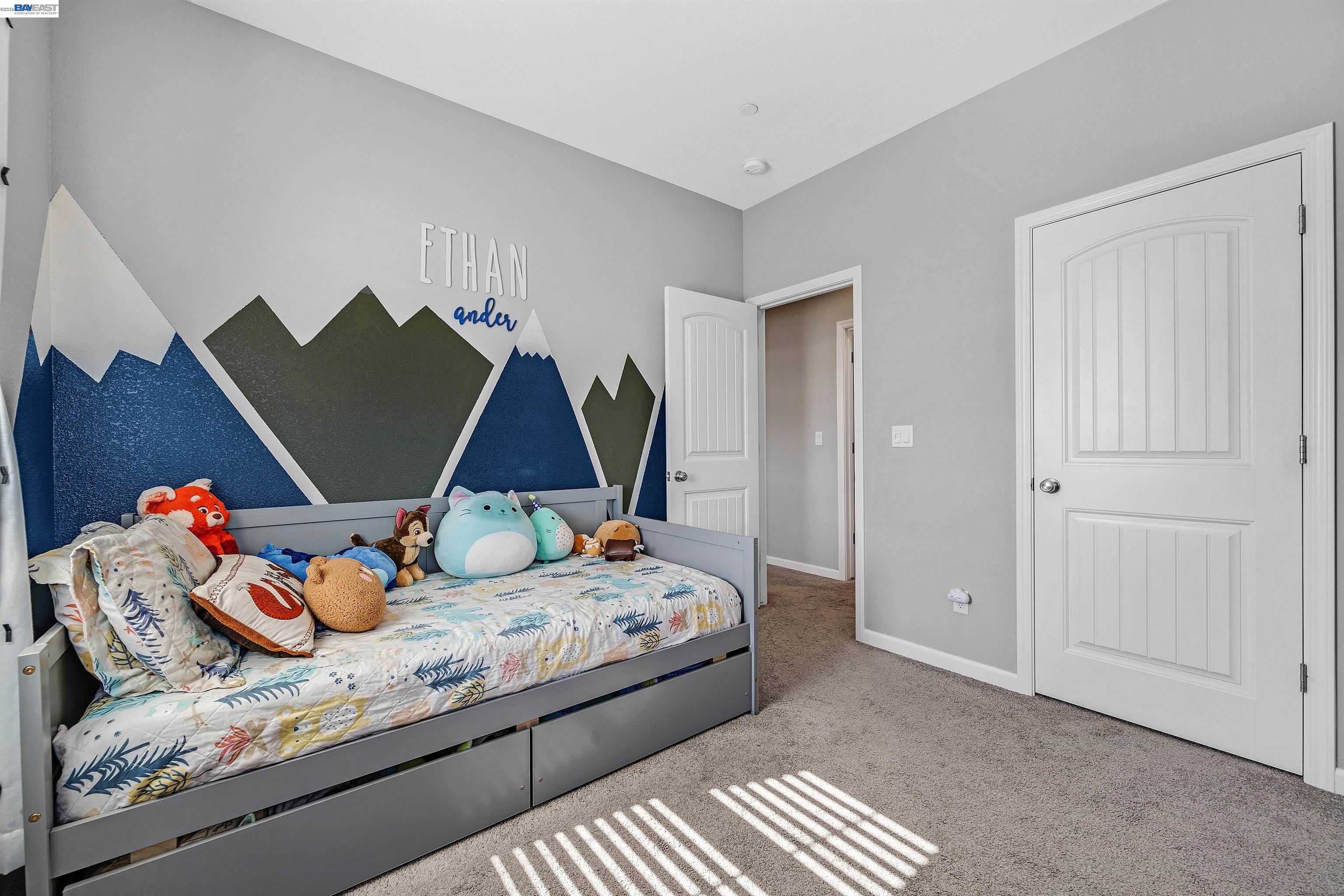 1589 Friendly Street Manteca, CA 95337 - Photo 38 of 50 a bedroom with two beds and white walls