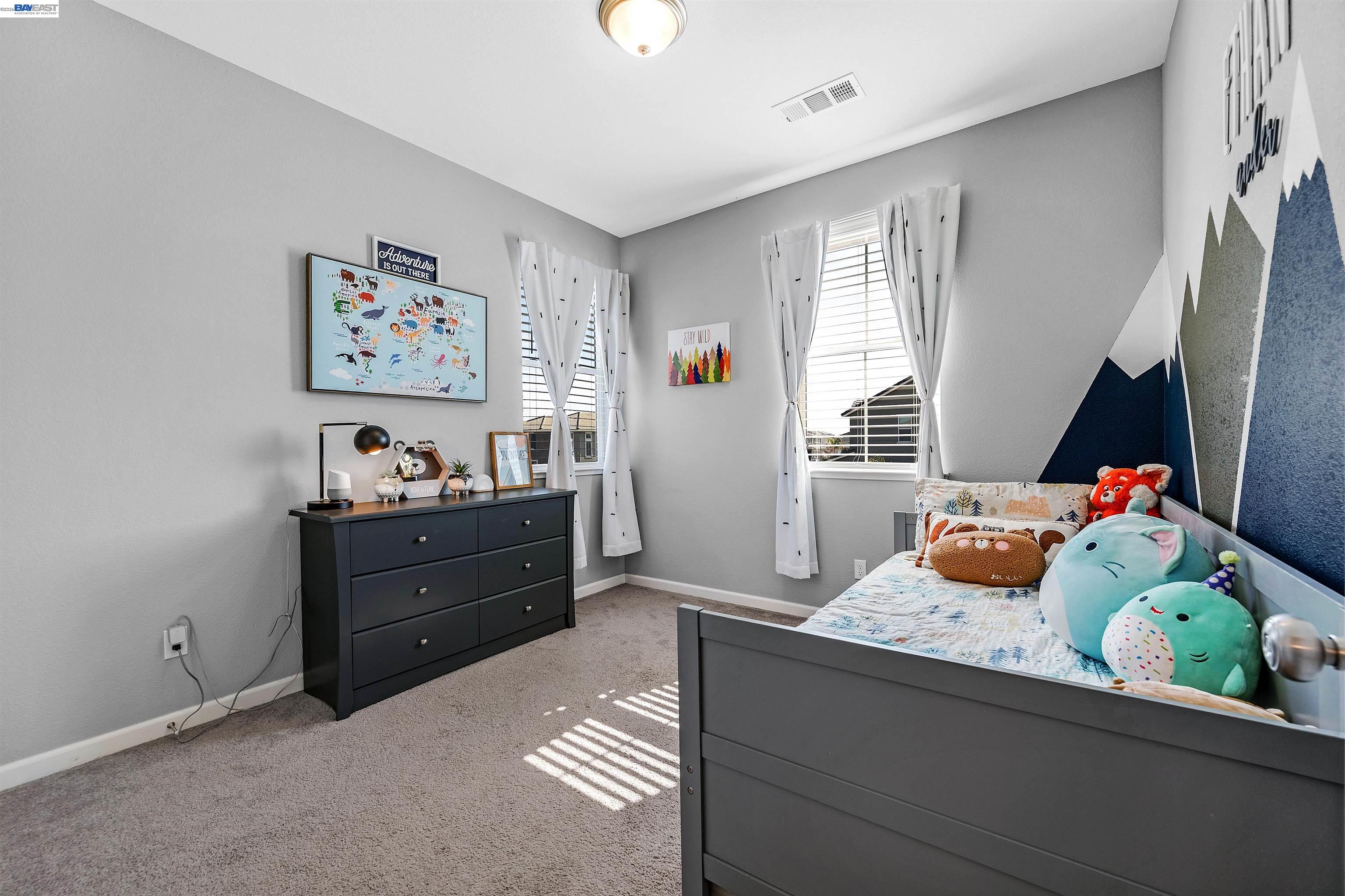 1589 Friendly Street Manteca, CA 95337 - Photo 39 of 50 a room with furniture and a window