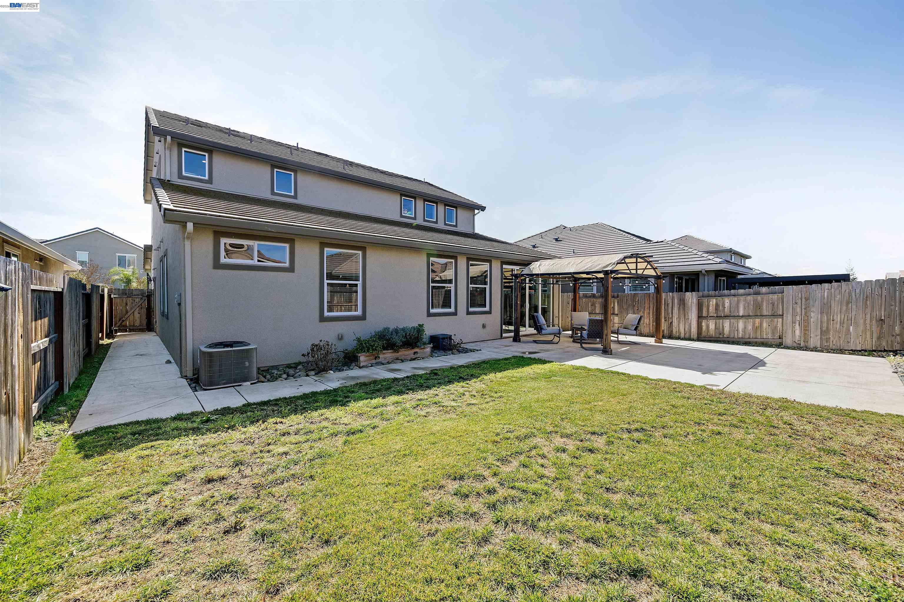 1589 Friendly Street Manteca, CA 95337 - Photo 43 of 50 a view of house with yard and sitting area