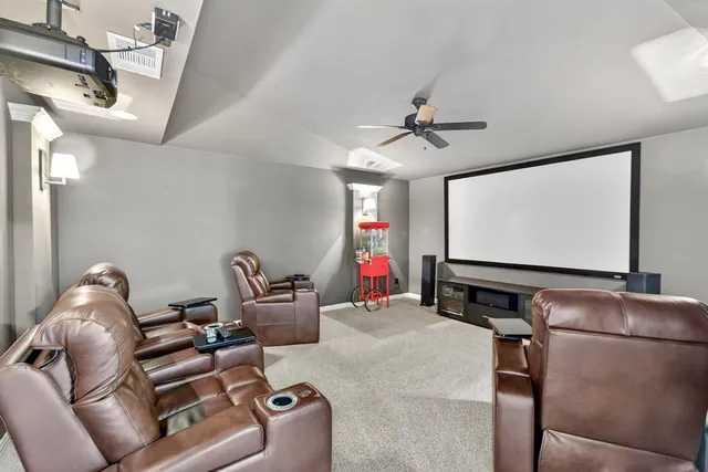 a room with furniture and screen