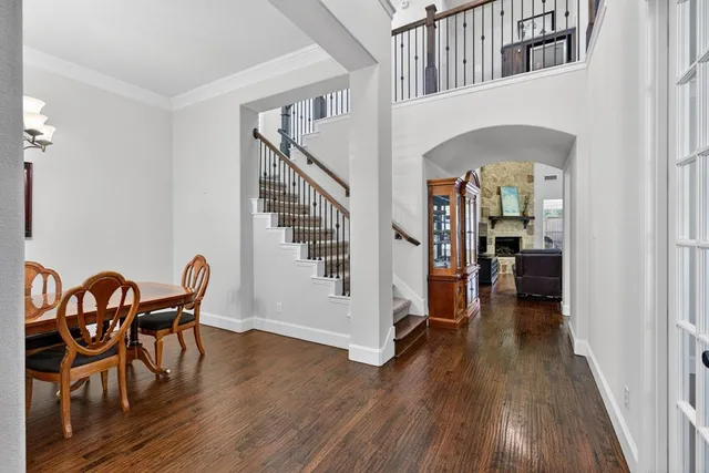 a view of a livingroom with furniture and hardwood floor